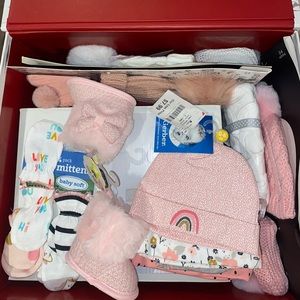 Newborn girl items. Hats, socks, mittens, onsies and more.
